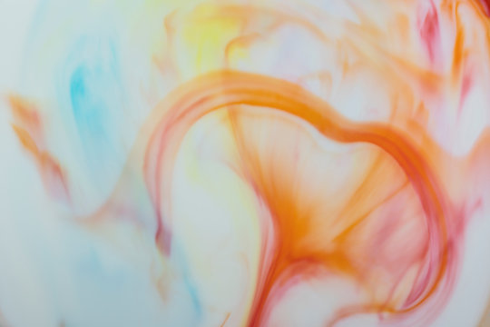 Abstract pastel colors in milk