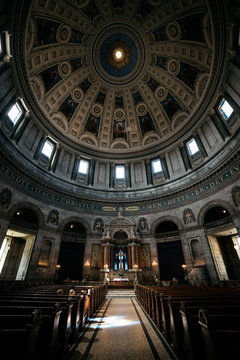 Gothic church interior with rows of seats