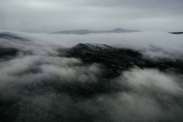 Mountain top covered with cloud