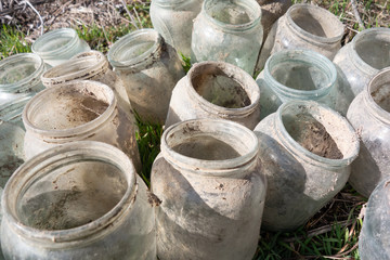 Fototapeta premium ?ld dirty glass jars covered with dust