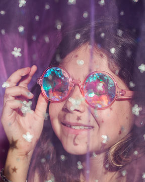 Girl With Purple Kaleidoscopic Glasses