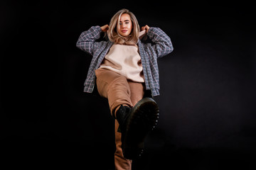 girl steps on a black background