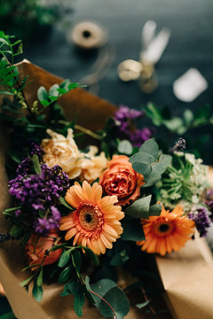 Detail of flower bouquet with props on the background