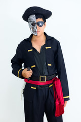 Young adult South East Asian wearing pirate costume with white background..