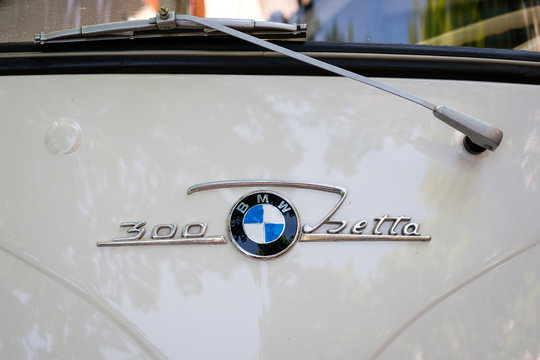 Car design detail and logo / brand name closeup of the BMW Isetta 300 at Oldtimer automobile event - Berlin, Germany - June 2018