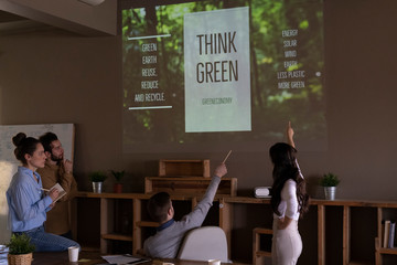 Young businesspeople working together on a green project