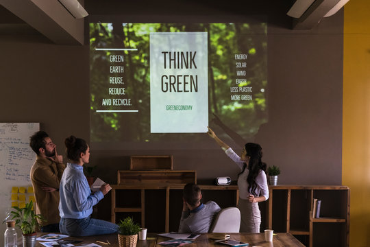 Young businesspeople working together on a green project