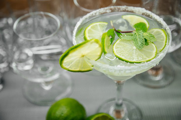 mojito cocktail on green background