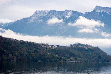 View of the caldonazzo lake (near trento, italy) with a group of eurasian (or common). Tower bell and mountains