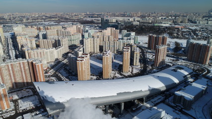 Pavshinskaya poyma district of Krasnogorsk, Moscow region, Russia. Mitino District is administrative district  of Moscow. Commuter town with very dense houses. View above. Winter snow day