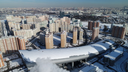 Pavshinskaya poyma district of Krasnogorsk, Moscow region, Russia. Mitino District is administrative district  of Moscow. Commuter town with very dense houses. View above. Winter snow day