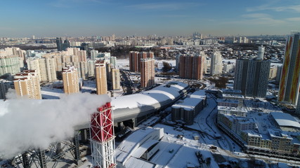 Pavshinskaya poyma district of Krasnogorsk, Moscow region, Russia. Mitino District is administrative district  of Moscow. Commuter town with very dense houses. View above.  Winter snow day