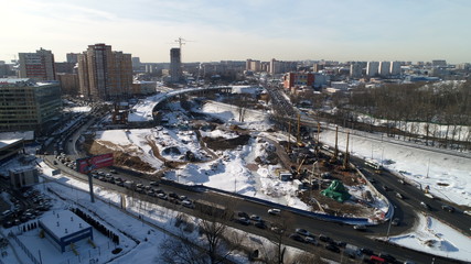 Pavshinskaya poyma district of Krasnogorsk, Moscow region, Russia. Mitino District is administrative district  of Moscow. Commuter town with very dense houses. View above.  Winter snow day