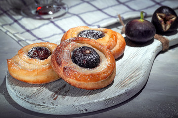 Fragrant baked goods with figs. Delicious pastries.