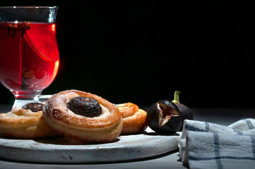 Fragrant baked goods with figs. Delicious pastries.