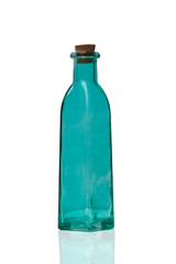 Cyan colored corked empty glass decorative bottle, isolated on white background, with clipping path, with reflection