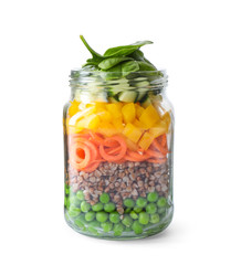 Healthy salad in glass jar isolated on white