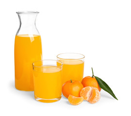 Bottle and glasses of tangerine juice with fruits isolated on white