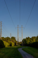 powerlines across residential pathway in spring in ottawa, ontario