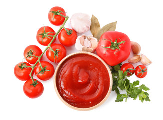 Composition with tomato sauce on white background, top view