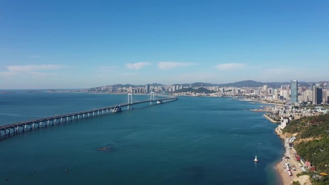 city skyline with bridge in dalian china