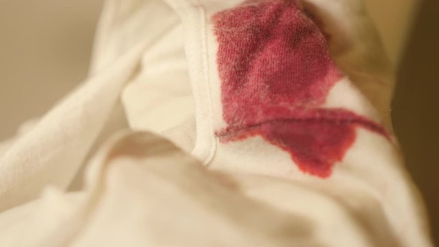 Close up dirty white panties in blood. Menstruation concept. Woman hygiene products