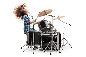Female drummer throwing hair back