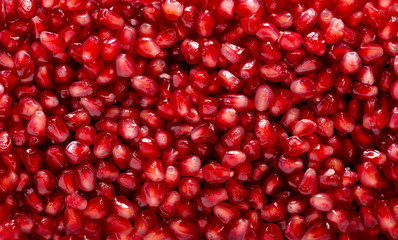 Organic Fresh Red Pomegranate Seeds Background