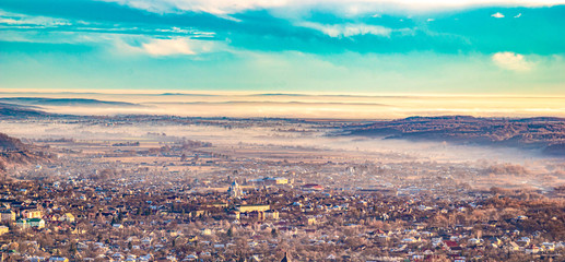 Morning city in the fog