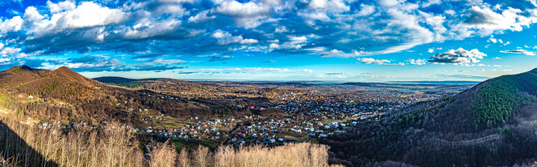 Clouds in the blue sky over the Carpathian city