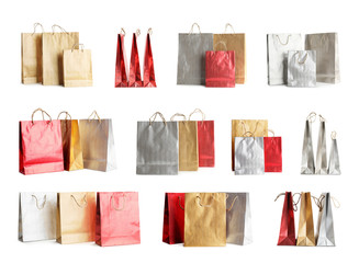 Set of paper shopping bags on white background