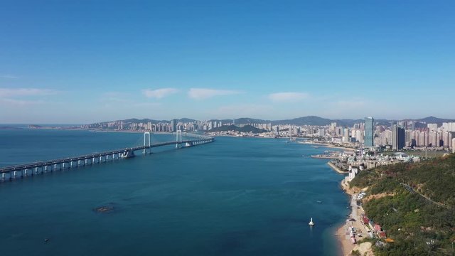 city skyline with bridge in dalian china