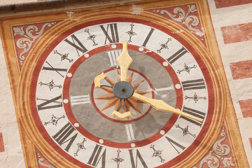 A detail of the clock painted on the bell tower of the St. Cristina little church in Val Gardena, recently restored it shows all its original vivid colors