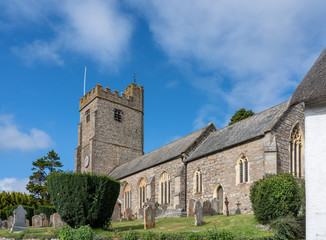 Fototapeta na wymiar Stone building of the parish church of Saint Mary in the pretty Devon village of Dunsford