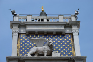 close up of the winged lion statue on St Mark's Clock Tower, Venice Italy