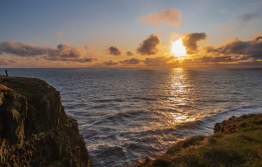 Stunning Latrabjarg cliffs, Europe's largest bird cliff and home to millions of birds. Western Fjords of Iceland. Sunset in september 2019.
