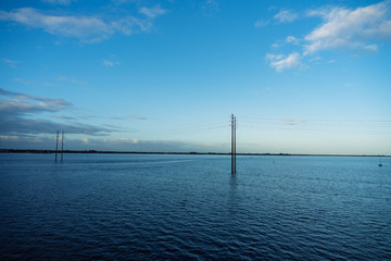 An Electric pole in water