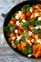 Warm salad with pumpkin and feta cheese. Healthly food. Keto diet.