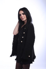 Beautiful brunette girl in black jacket