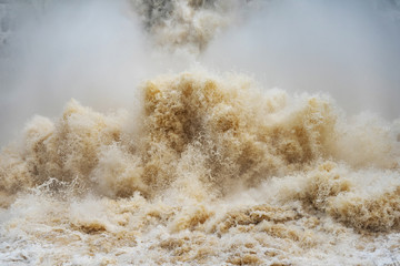 Gushing water flowing from dam