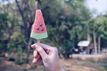 ice cream with blurred green bokeh and nature background