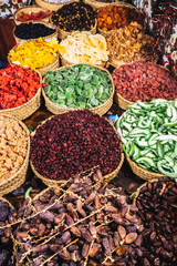 Pile of dates and nuts for sale at a natural food stall.