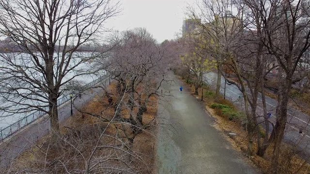 aerial shot, central park, lake Jacqueline Kennedy Onassis Reservoir, people exercising, jogging