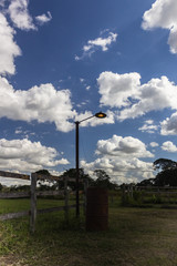 lamppost under a cloudy blue sky in Venezuela