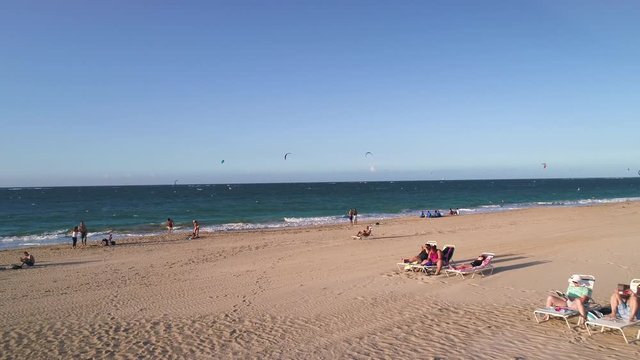 Kitesurfers enjoying Ocean Park Beach sunset in Puerto Rico
