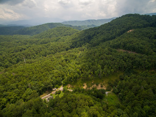 Fototapeta na wymiar A drone aerial view of deep countryside with lush greens in the tourist area of Pigeon Forge Tennessee