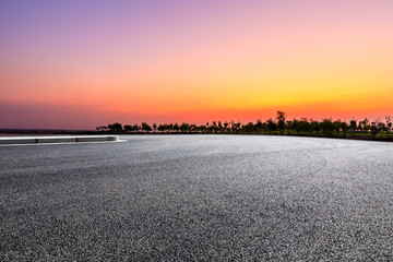 Empty asphalt road and beautiful sky at sunset.