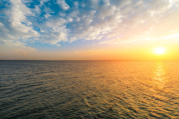 Dreamy sunset landscape by the lake