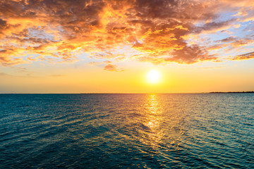 Dreamy sunset landscape by the lake