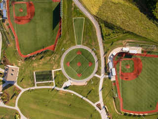 A top down, aerial, drone view of a practice baseball and softball field in the tourist town of Pigeon Forge Tennessee - obrazy, fototapety, plakaty